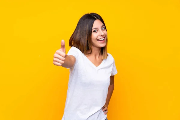 Depositphotos 317939792 stock photo young woman over isolated yellow